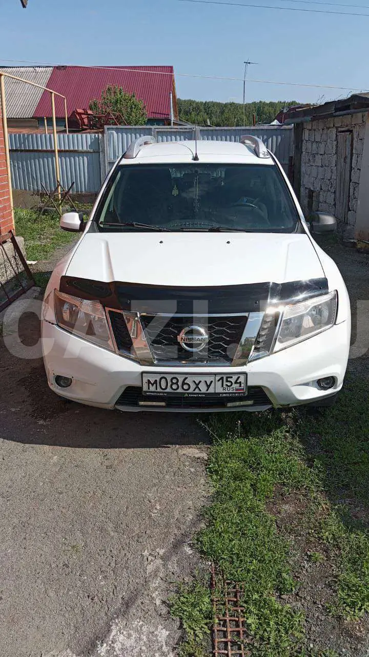 Автомобиль Nissan Terrano, 2015 год — фото 2