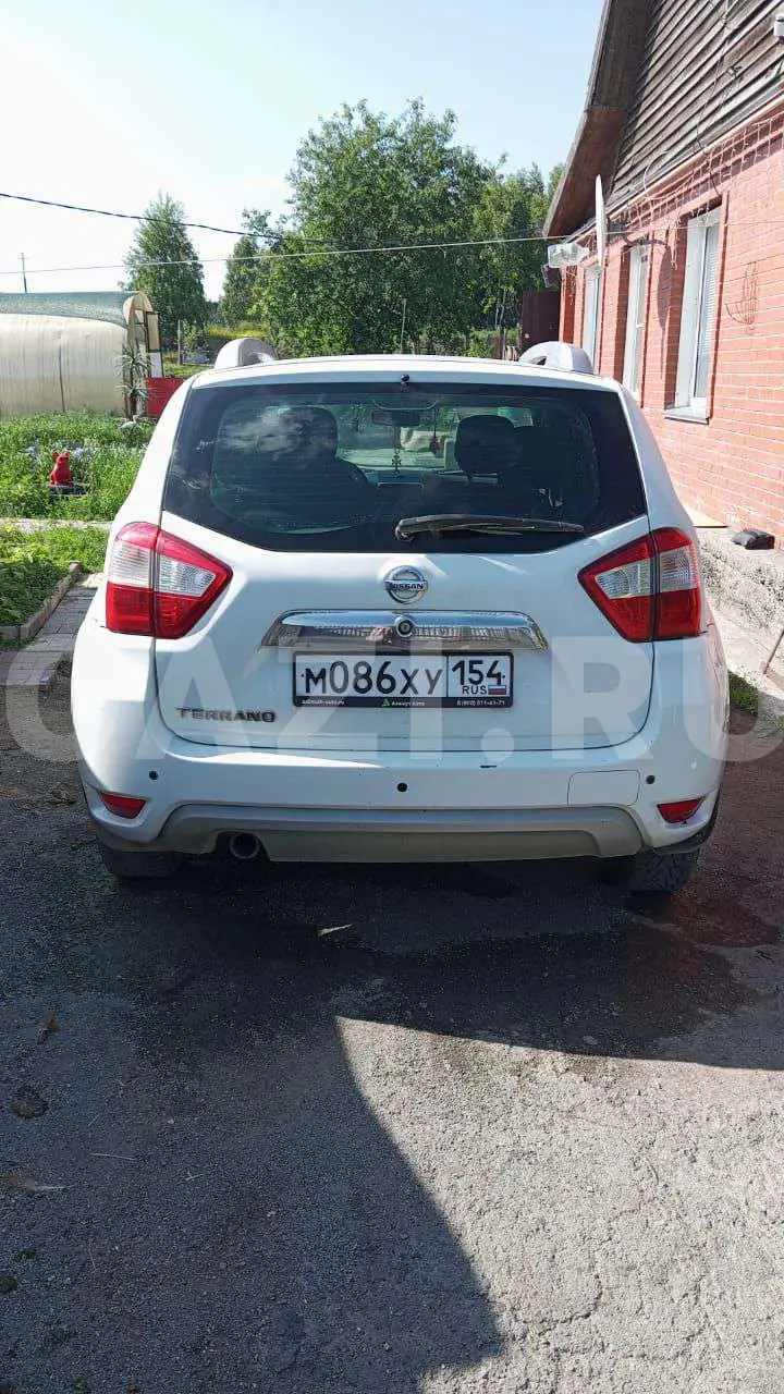 Автомобиль Nissan Terrano, 2015 год — фото 4