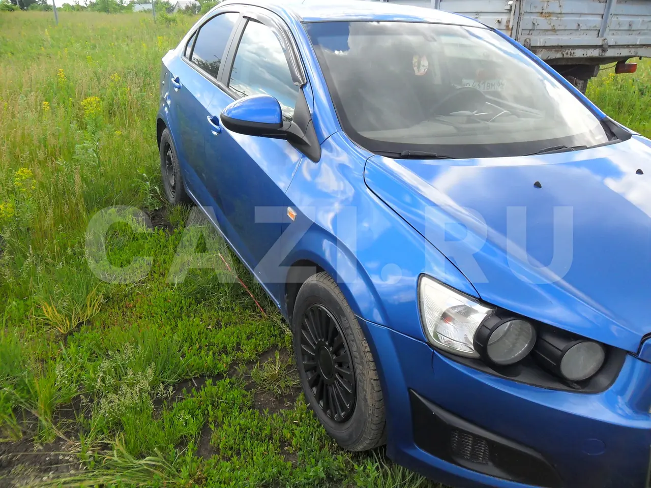 Автомобиль Chevrolet Aveo, 2012 год — фото 5