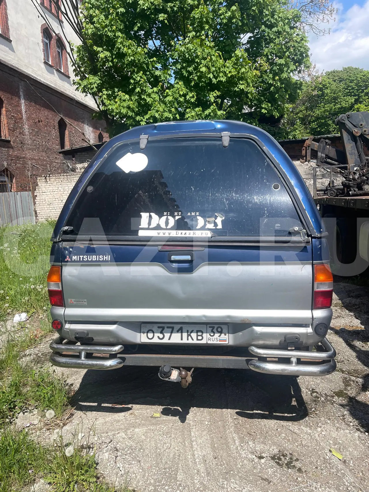Автомобиль Mitsubishi L200, 2002 год — фото 2