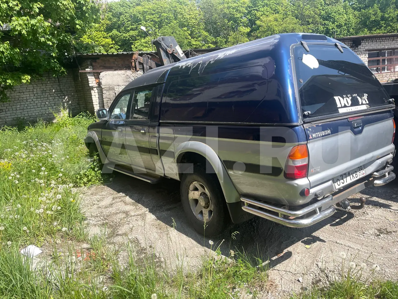 Автомобиль Mitsubishi L200, 2002 год — фото 3