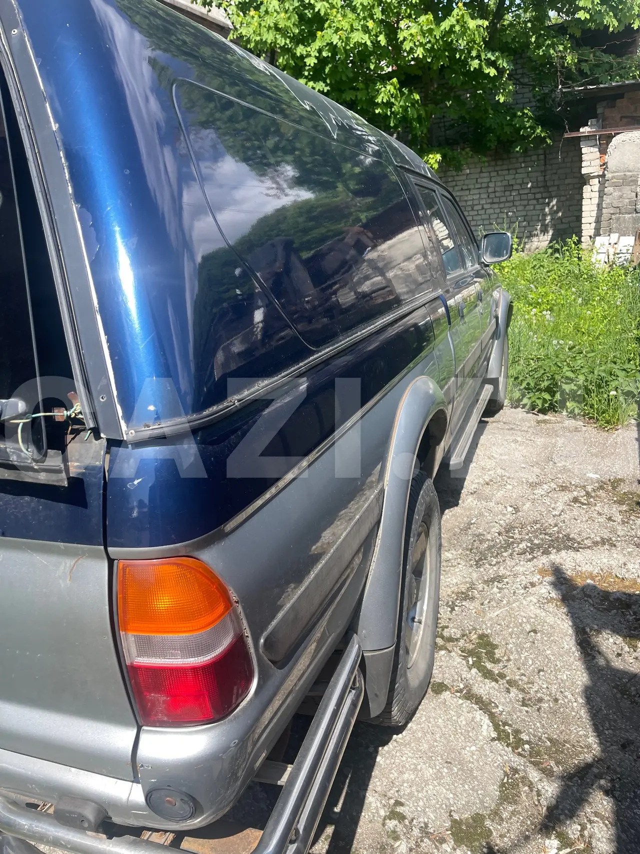 Автомобиль Mitsubishi L200, 2002 год — фото 4