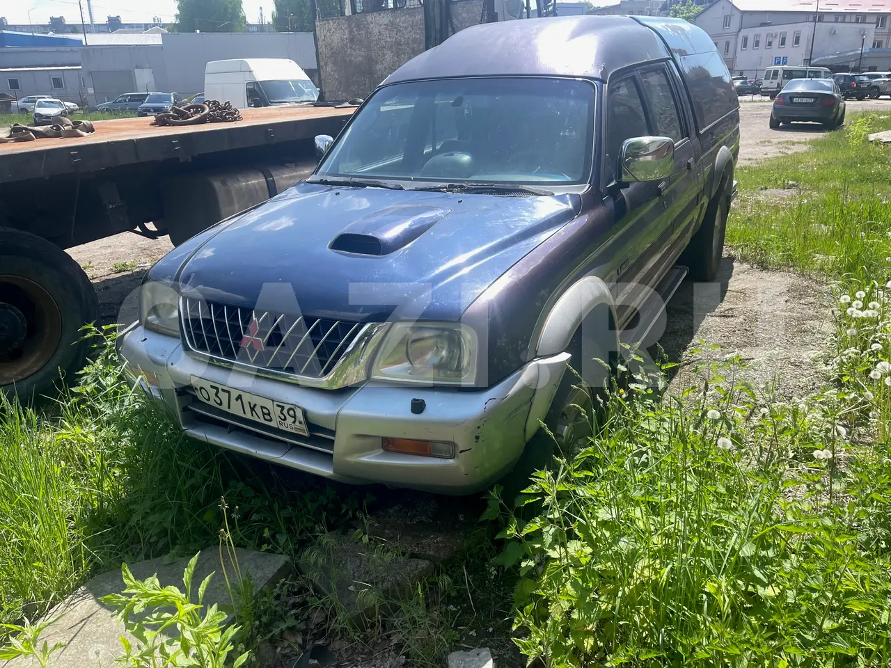 Автомобиль Mitsubishi L200, 2002 год — фото 6