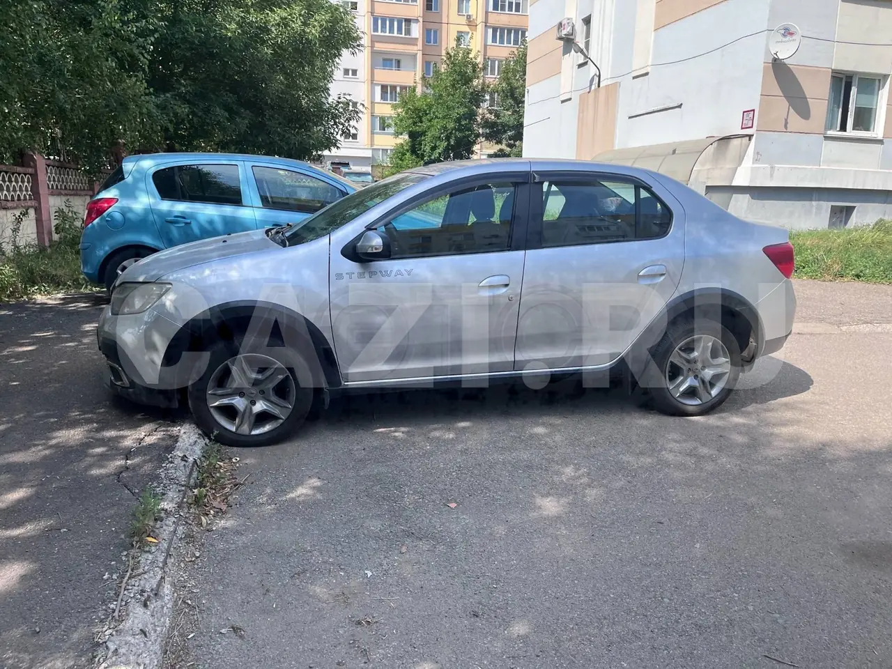 Автомобиль Renault Logan, 2019 год — фото 1