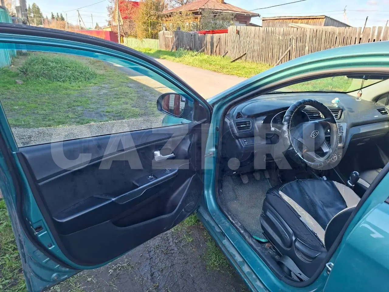 Автомобиль Kia Rio, 2012 год — фото 5