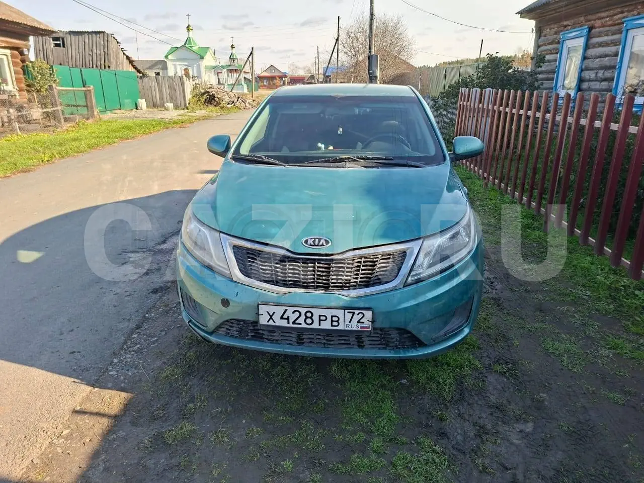 Автомобиль Kia Rio, 2012 год — фото 1