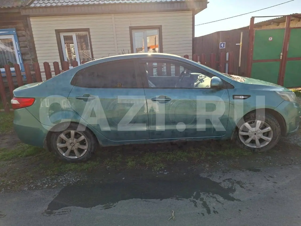 Автомобиль Kia Rio, 2012 год — фото 9