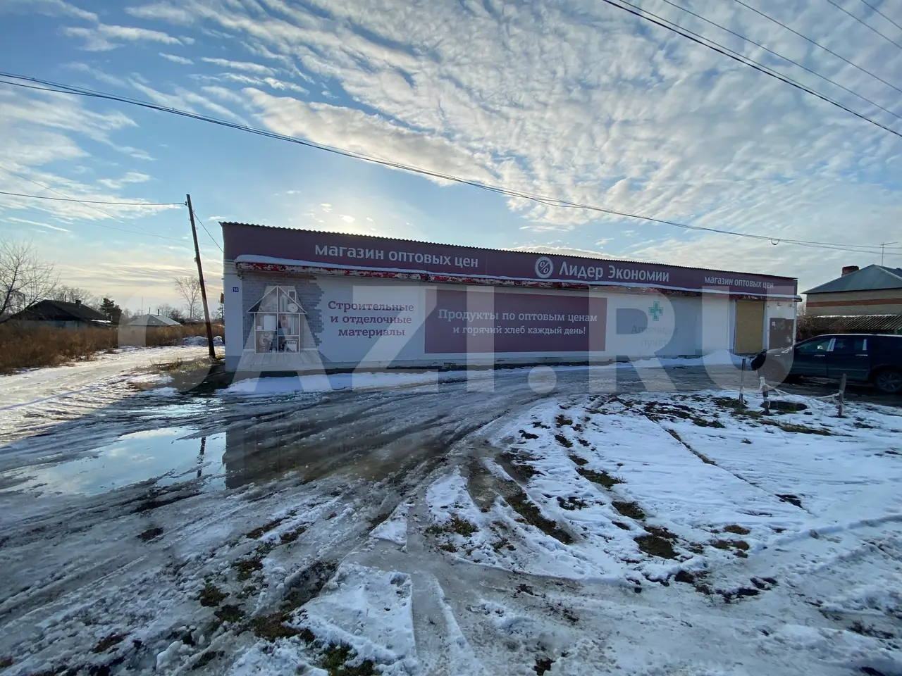 Здание магазина ТПС "Универмаг" 334 м² + Участок 1 283 м² — фото 1