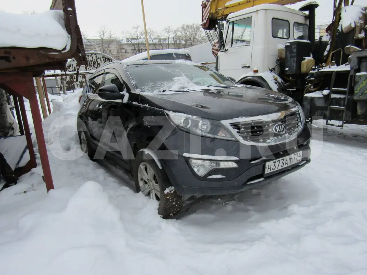 Автомобиль Kia Sportage, 2013 год — фото 1
