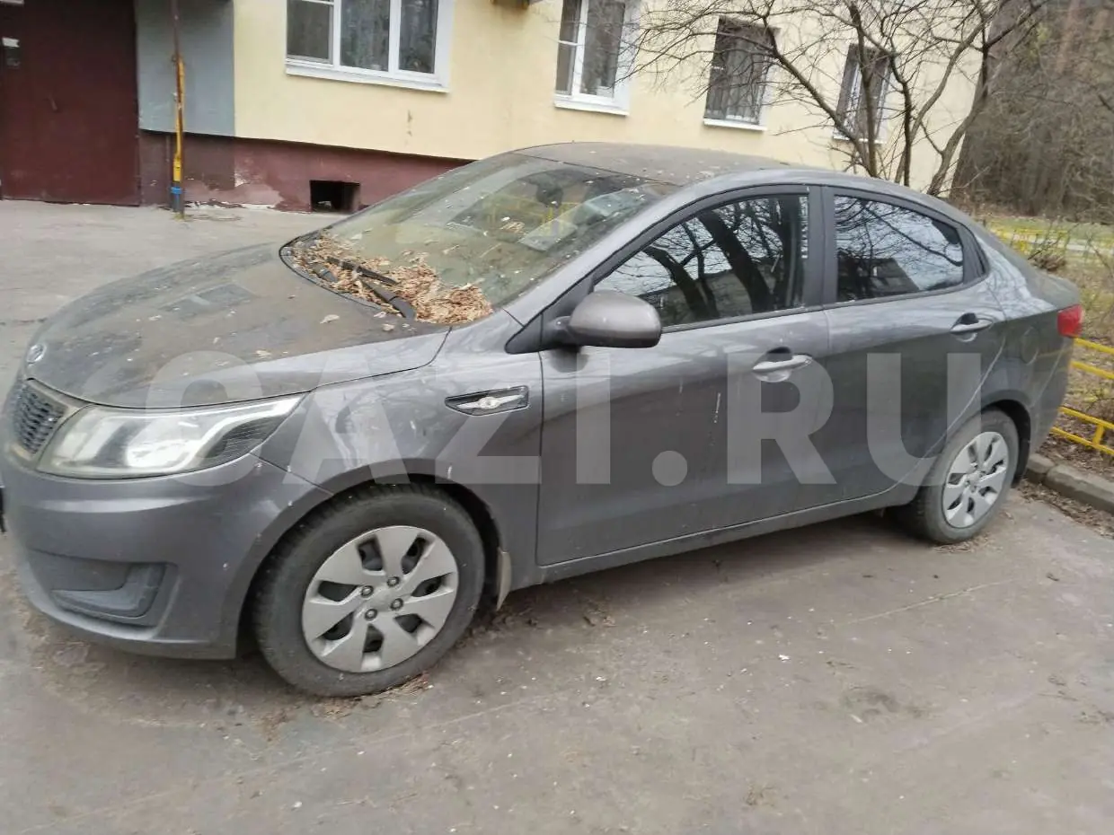 Автомобиль Kia Rio, 2012 год — фото 1