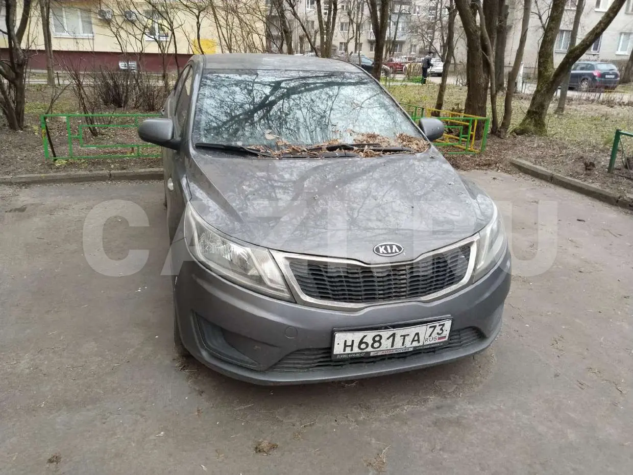 Автомобиль Kia Rio, 2012 год — фото 9